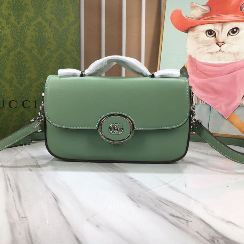 G*u*i top handle bags